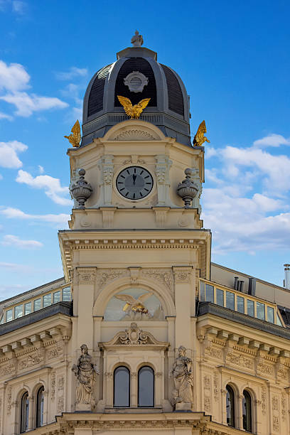 istock Ornate Clock Tower Building Against Blue Sky 2246920139