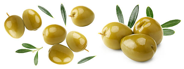 istock green olives with green leaves isolated on white background. clipping path 2246925628