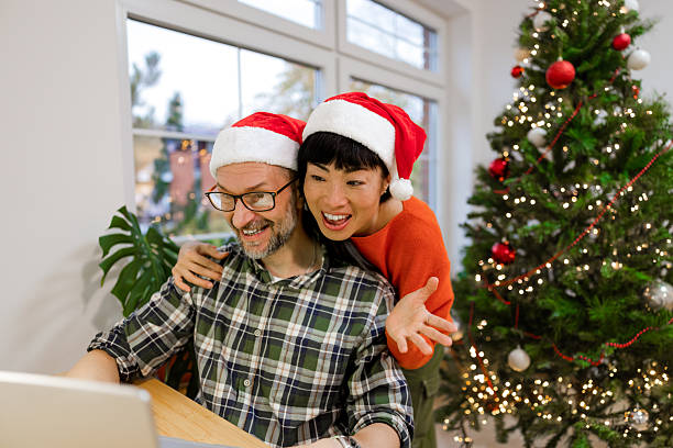 istock Couple sharing affectionate moment while he attending video call and she hugging from behind 2246931875