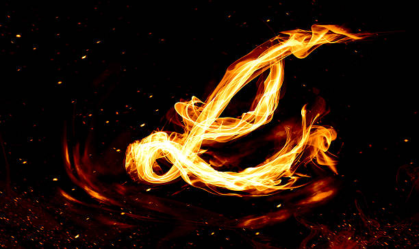 istock Fire forms a swirling letter L in an artistic display during a nighttime event celebrating light and creativity 2246933745