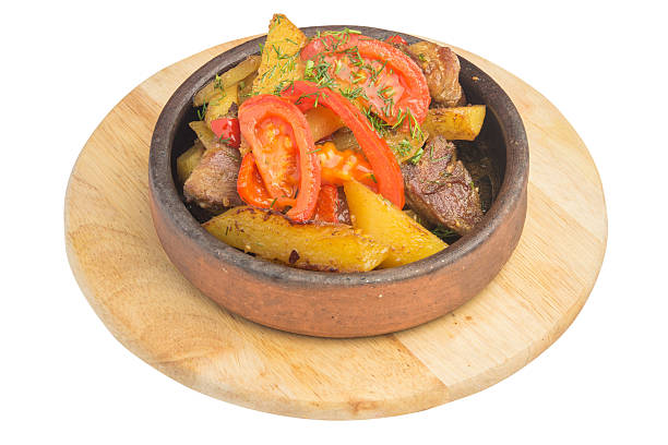 Baked meat with potatoes and tomatoes