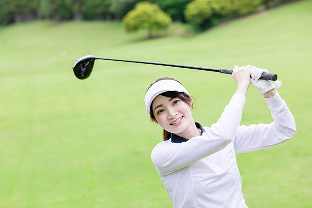 istock Asian woman enjoying golf 2246933802