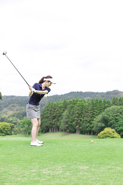 istock Asian woman enjoying golf 2246933811