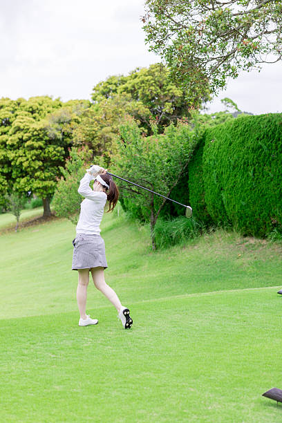 istock Asian woman enjoying golf 2246934022
