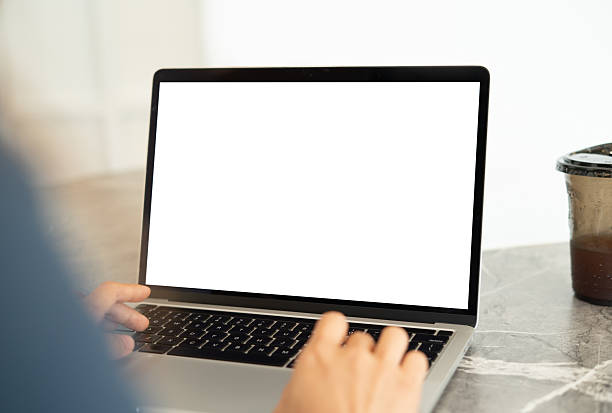 istock Mockup, laptop computer with blnak white screen. Person working, typing on laptop computer at home office, mockup, template for digital marketing or web design 2246935044