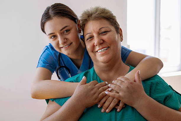 istock Female nurse hugging a patient 2246937335