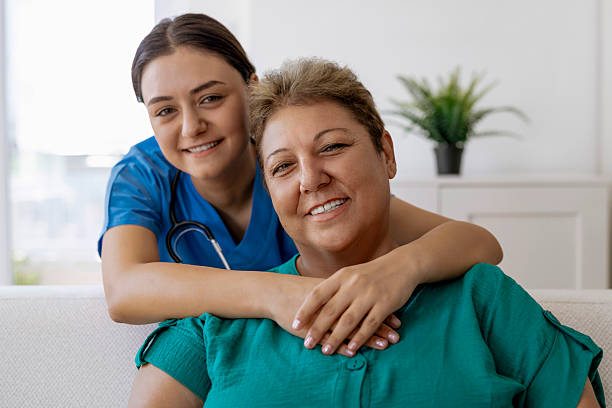 istock Female nurse hugging a patient 2246937356