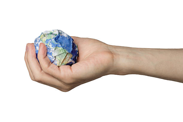 istock Planet Earth in the hands of garbage pollution ecology 2246937594