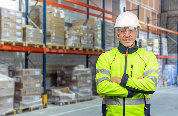 istock Warehouse worker wearing PPE in industrial storage area 2246943285