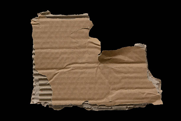 istock Isolated torn cardboard scrap with visible ridges and rugged outline, suitable for labeling, creative collage elements or vintage-style layouts. 2246944072