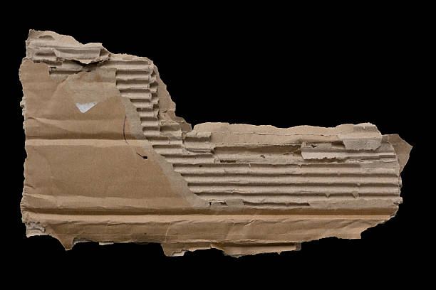 istock Distressed cardboard piece featuring organic shape and textured surface, suitable for vintage design, packaging accents or eco materials. 2246945814