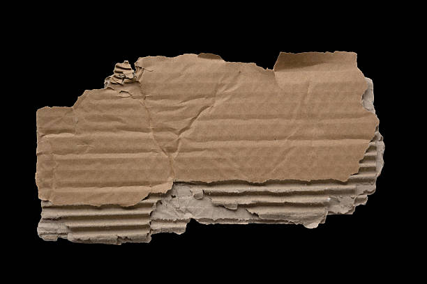 istock Small uneven cardboard segment with layered material and worn outline, perfect for eco-labels, packaging visuals or textured accents. 2246946216