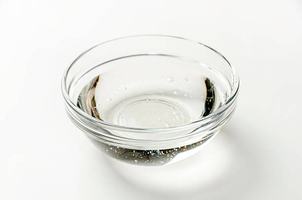 istock Clear Mizuame Syrup(Starch Syrup) in Glass Bowl on White Background 2246946554