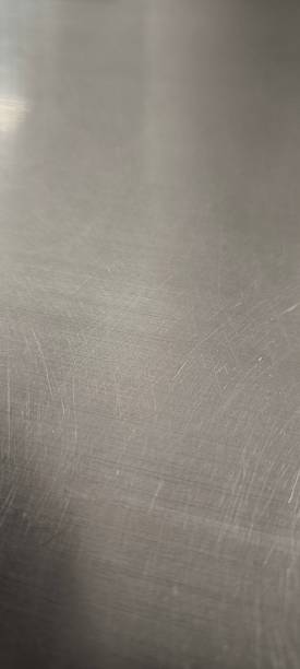 istock Used stainless steel sheet has scratches. 2246951015