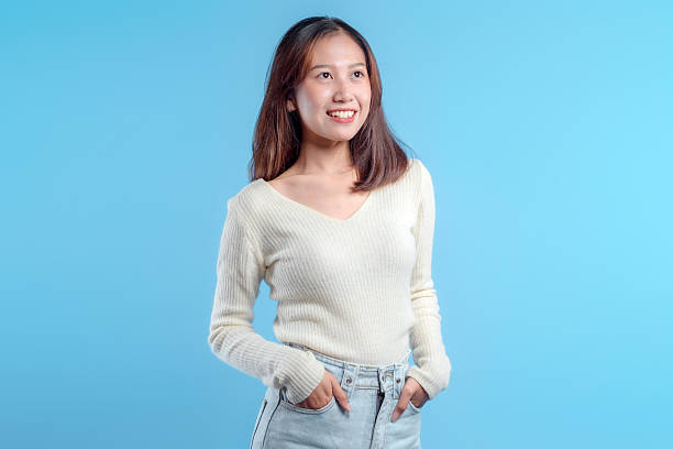 istock Smiling Indonesian Woman in Confident Friendly Pose 2246959590