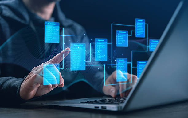 istock A businessman interacts with a database schema on a laptop, representing finance and accounting data management,digital transformation, and modern financial technology innovation for business systems. 2246961121
