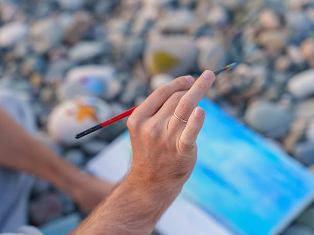 Close Up of Brushwork During Outdoor Art Session. High quality photo