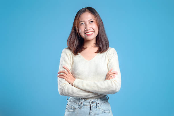 istock Thoughtful Indonesian Woman with Confident Smile 2246961464