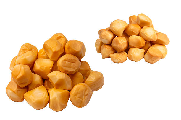 istock Piece of cheese isolated on white bacckground. 2246962472