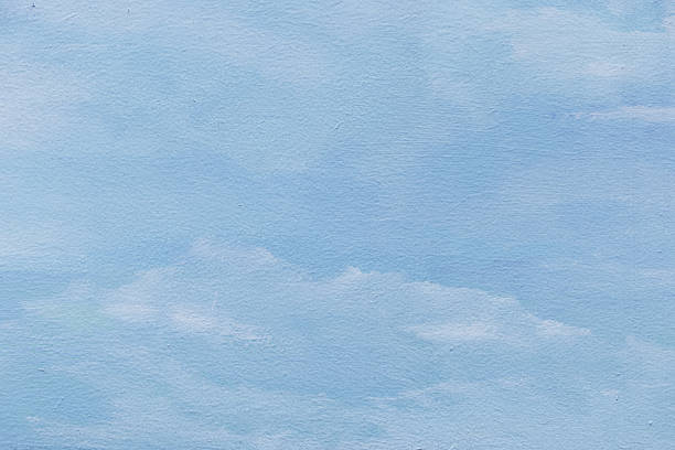 istock oil paint palette with blue and white mixed strokes; textured surface with subtle highlights creating abstract artistic background ideal for creative projects, design, and modern art concepts. 2246962594