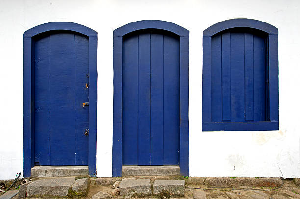 istock Blue doors and window shutter, example of Portuguese colonial architecture, Paraty, Brazil 2246963983