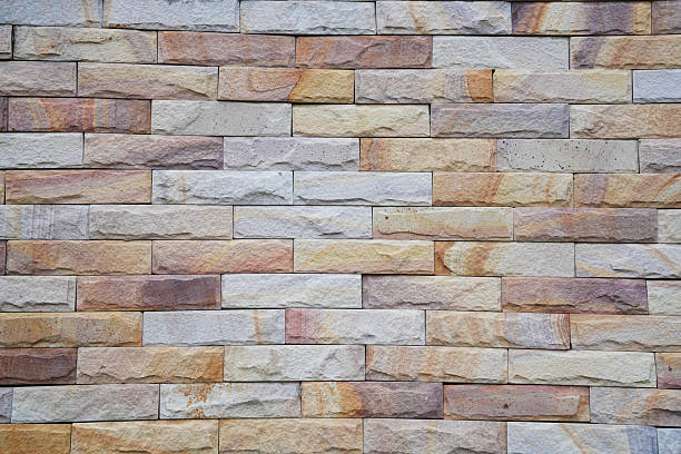istock A brick wall with a brown and tan color 2246968179