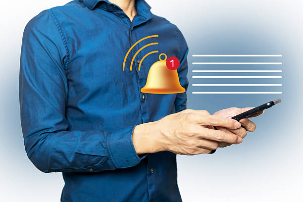 istock Receiving notifications via mobile phone, mobile users receive information, message bell 2246974066