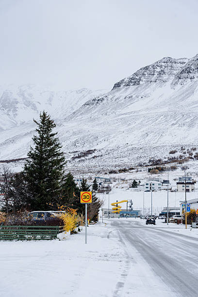 istock Winter scene in Iceland, featuring snow-covered mountains and a road. 2246974825