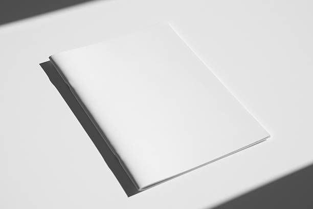 istock A4 portrait magazine, catalog cover mockup, saddle stitch, hard shadows 2246978825