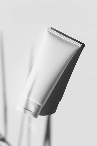 istock White cream tube mockup, shadow overlay, sunlight 2246979418