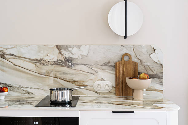 istock Modern kitchen interior featuring marble countertop and stylish cooking space 2246980427