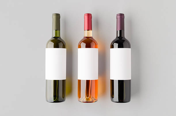 istock Red, white and rose wine bottle mockup 2246980437