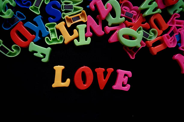 istock colorful 3d alphabet say love on black background 2246981620
