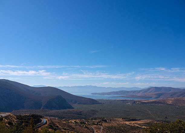 Panoramic view from Delphi to the olive gardens and the Corinth Gulf in Greece