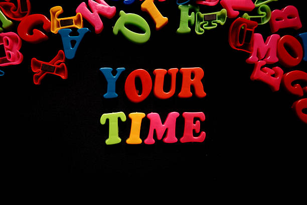 istock colorful 3d alphabet your time on black background 2246982826