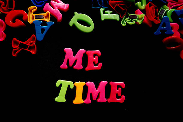 istock colorful 3d alphabet say me time on black background 2246982831