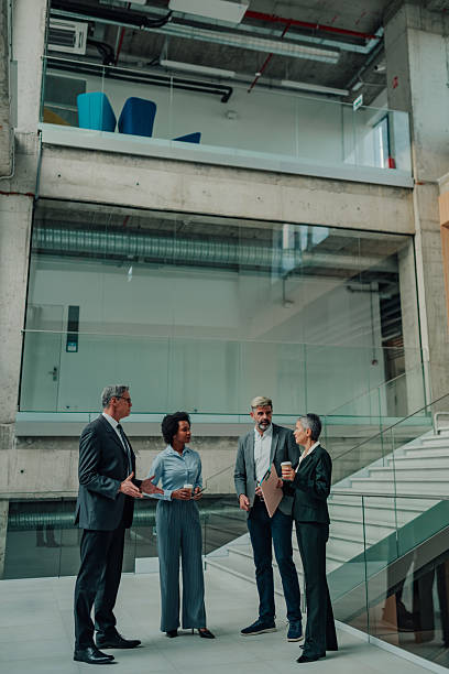 istock Business colleagues having a casual discussion in modern office 2246988752