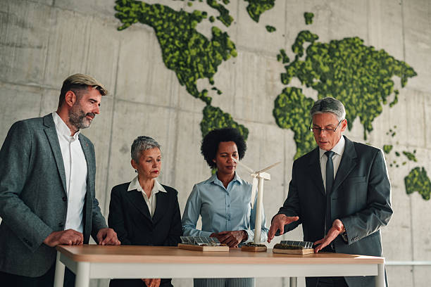 istock Business partners discussing renewable energy solutions in office 2246989267