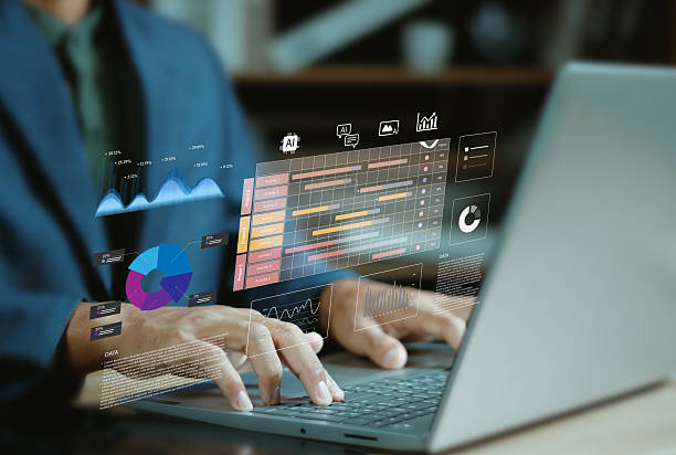 istock Business Concept of Project Management and Timeline Scheduling with AI Technology, Professional Analyzing Gantt Charts and Tracking Workflow Progress with Advanced Planning and Deadline Execution Tool 2246990613