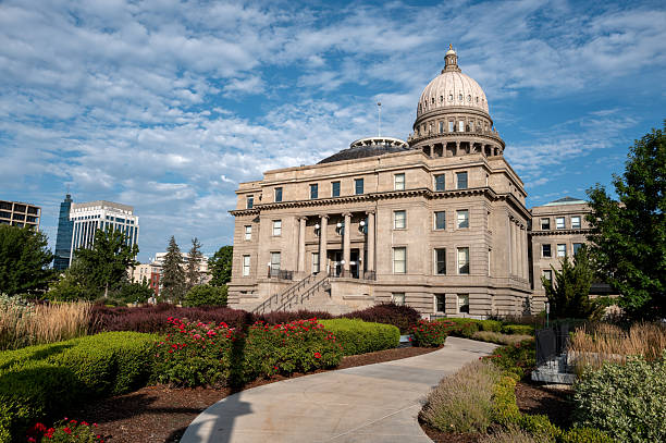 Sidewalk leads to the capital of Idaho with flower garden