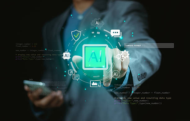 istock Businessman points to icon glowing AI icon with command prompt, representing artificial intelligence, prompt engineering, coding technology, digital transformation, and smart innovation in business. 2246991980