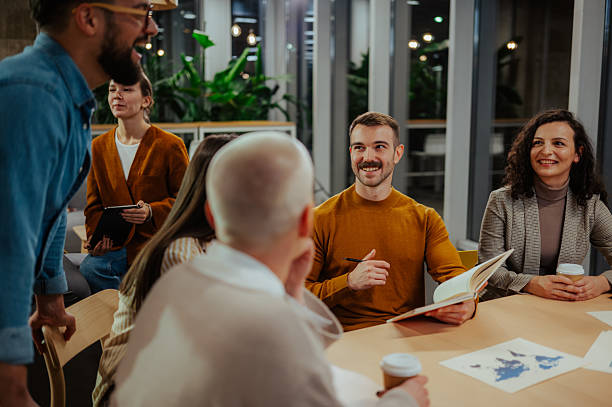 istock Business colleagues collaborating during a vibrant office meeting 2246992113