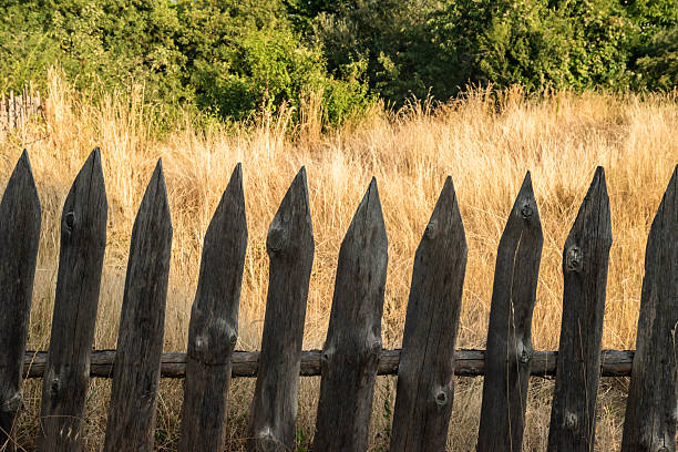 istock Rustic Wooden Fence at Sunset 2246992354