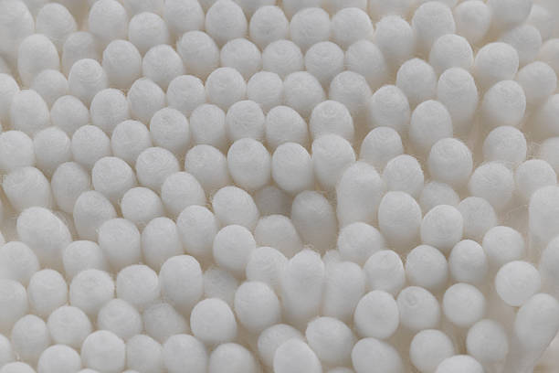 istock Macro View of Tightly Packed White Cotton Swabs 2246992659
