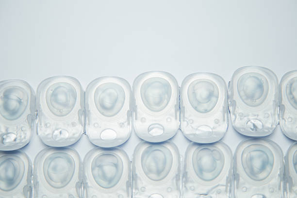 istock Many daily contact lenses in a disposable protective case lie at the bottom on a white background with space for text. The concept of ophthalmology, vision correction, eye care. 2246994907