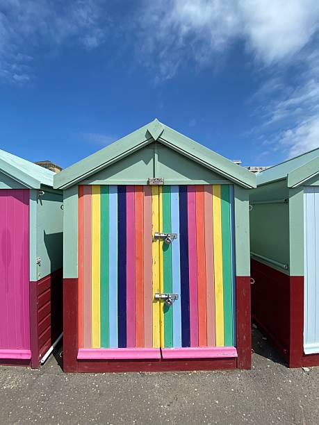 istock Rainbow Beach Hut Doors on a Sunny Hove Seafront 2246994926