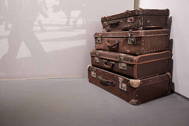 istock Vintage suitcases stacked indoors 2246995407