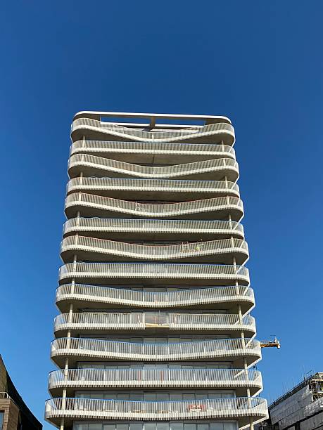 istock Modern Coastal Architecture with High-Rise Building Viewed from Pebble Beach in Worthing West Sussex 2246998276