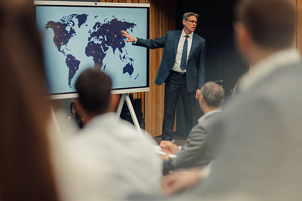 istock Businessman presenting global network strategy during corporate meeting 2247002558