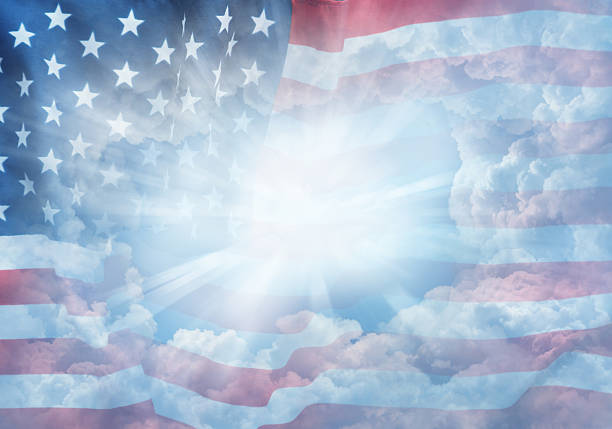 American flag in blue sky